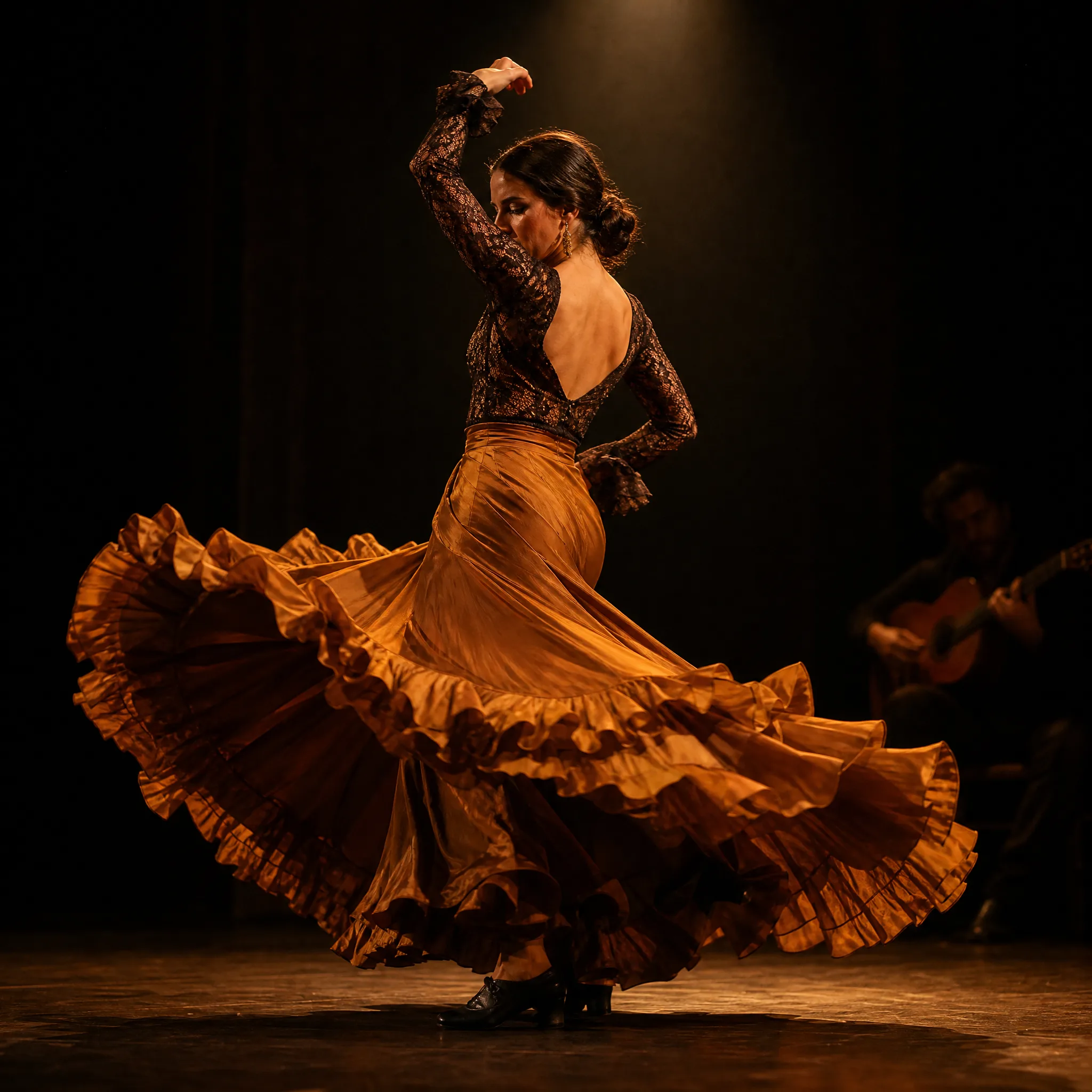 Flamenco dancer mid-turn on a dim stage, her long amber ruffled skirt flaring out under a single spotlight